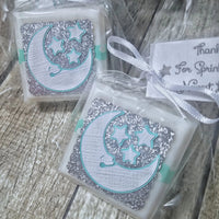 Custom Baby shower soap favors twinkle twinkle little star themed shown in light blue tied with a ribbon tagged personal wording 