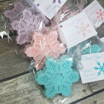 Soap snowflake favors made with soap in purple pink and light blue