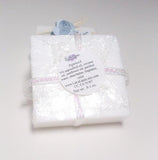 the back of a soap favor with a lalalipsie ingredients label that is included on every favor