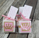 pink and gold princess crown soap favors tied with ribbon and a custom worded hanging tag