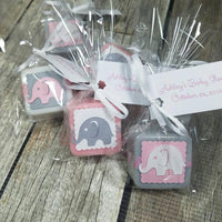pink white and grey soap favors with baby elephants and tied with personalized tag on a ribbon